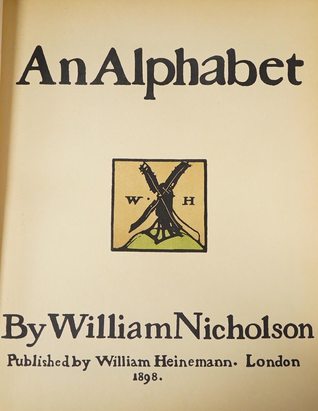 Nicholson, William - An Alphabet. 1st edition. coloured title device and 26 coloured lithographed plates, sports almanac slip tipped-in at end; original coloured pictorial boards, 4to. 1898